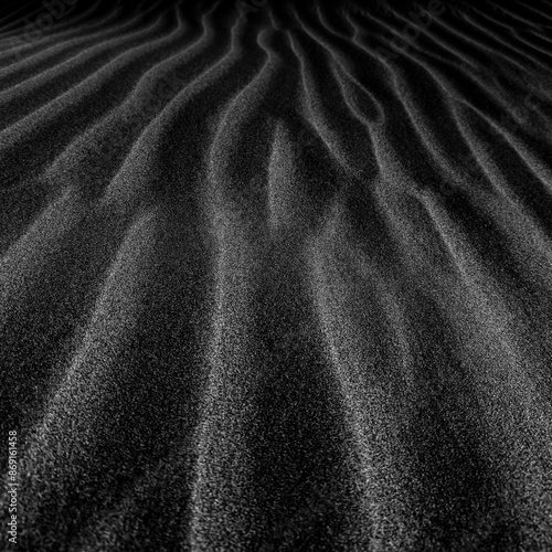 black texture sand ripples in the sand
