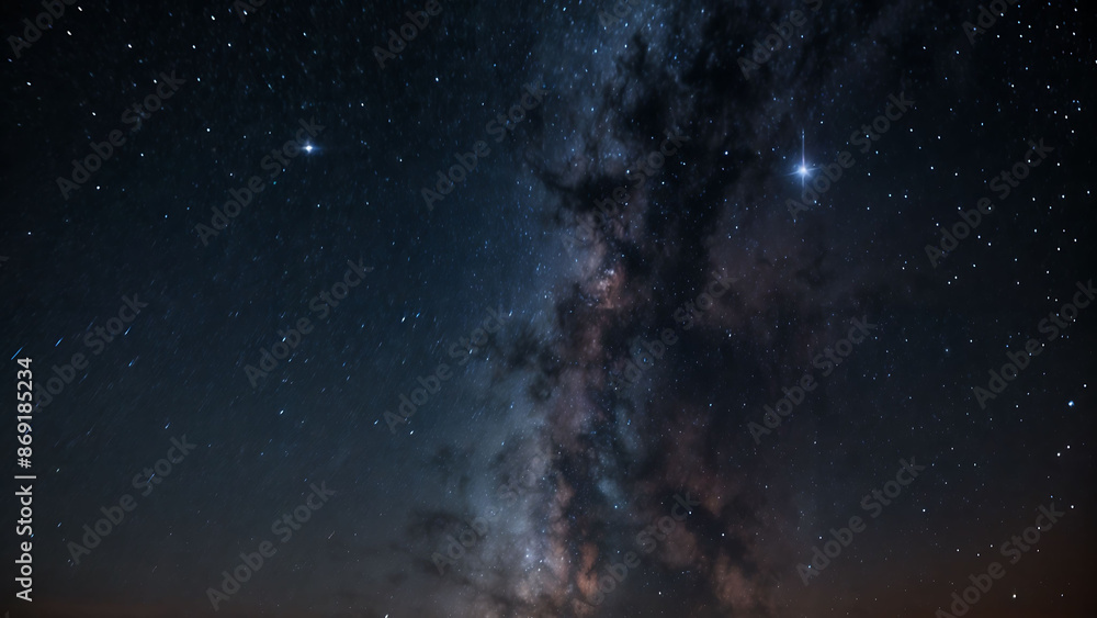 Fototapeta premium A night sky featuring the Milky Way and stars.