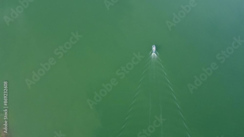 Aerial view of fishing boat in dam Thailand.