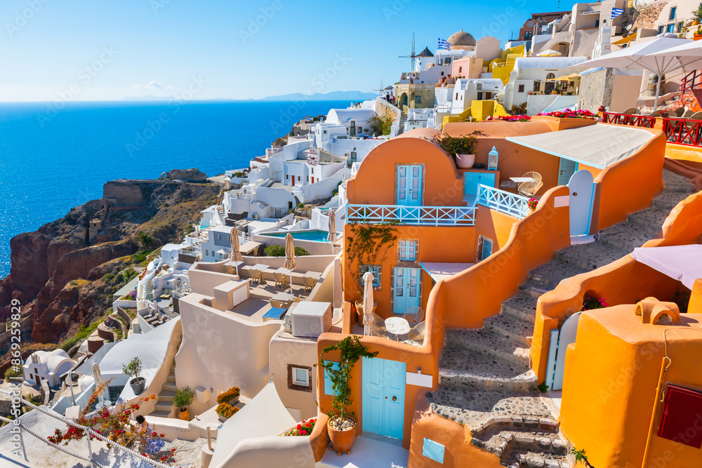 Santorini island, Greece. Colorful architecture in Oia town. Beautiful cityscape at sunset.