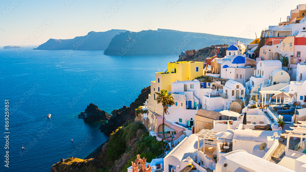 White architecture in Santorini island, Greece. Beautiful view of Oia town at sunset.