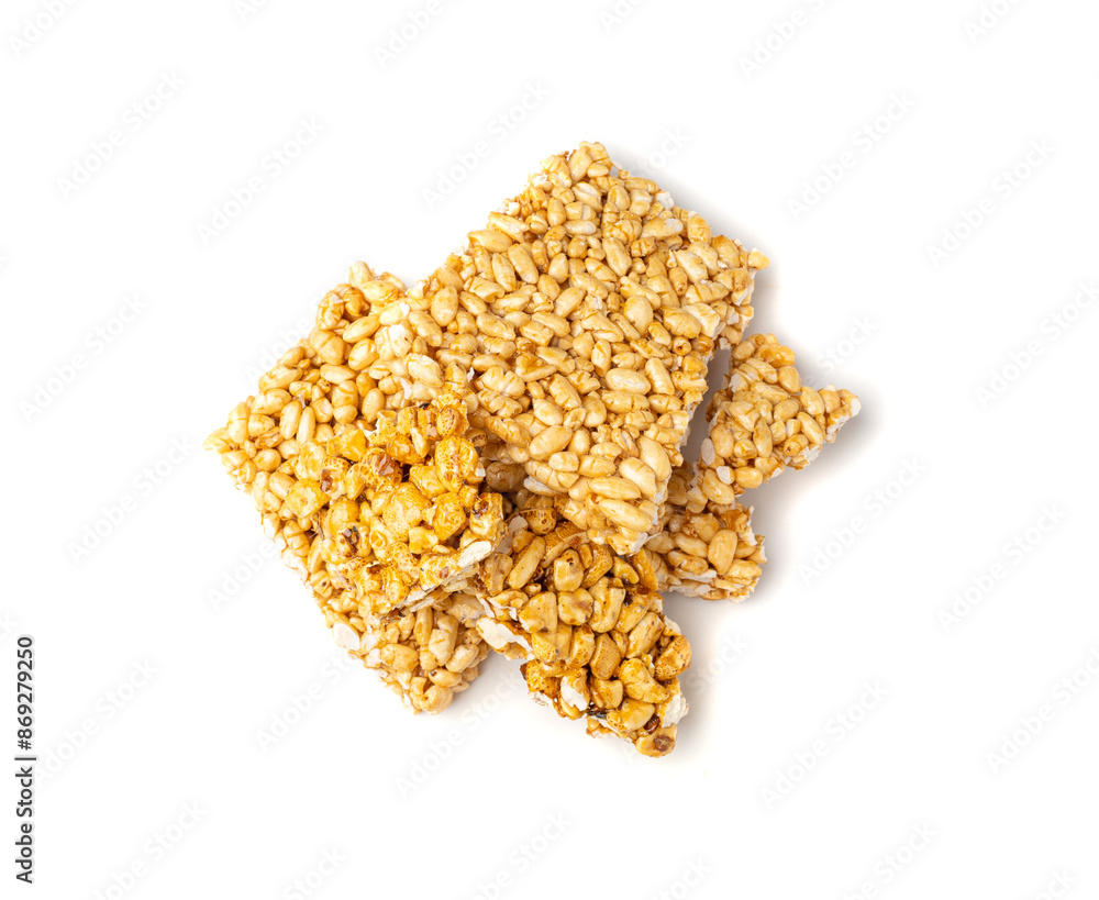 Puffed rice bar isolated, sweet wheat kozinaki, puff cereal block pieces, sugar crispy wheat bar, healthy popped dessert Puffed rice bar isolated, sweet wheat kozinaki, puff cereal block pieces, sugar crispy wheat bar, healthy popped dessert