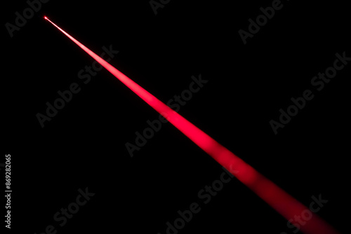 Close up of laser beam isolated on black background
