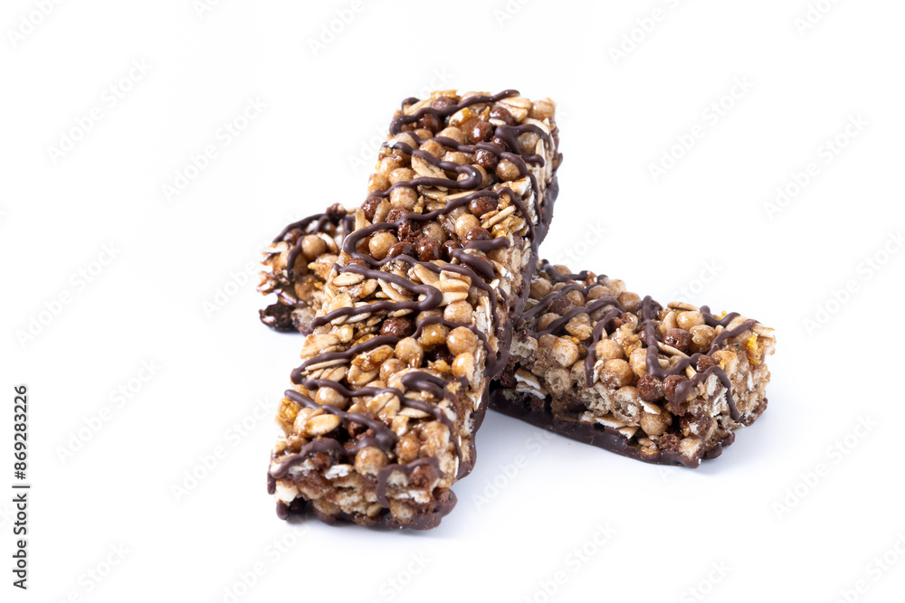 Healthy Muesli bars with nuts and black chocolate isolated on white background Healthy Muesli bars with nuts and black chocolate isolated on white background
