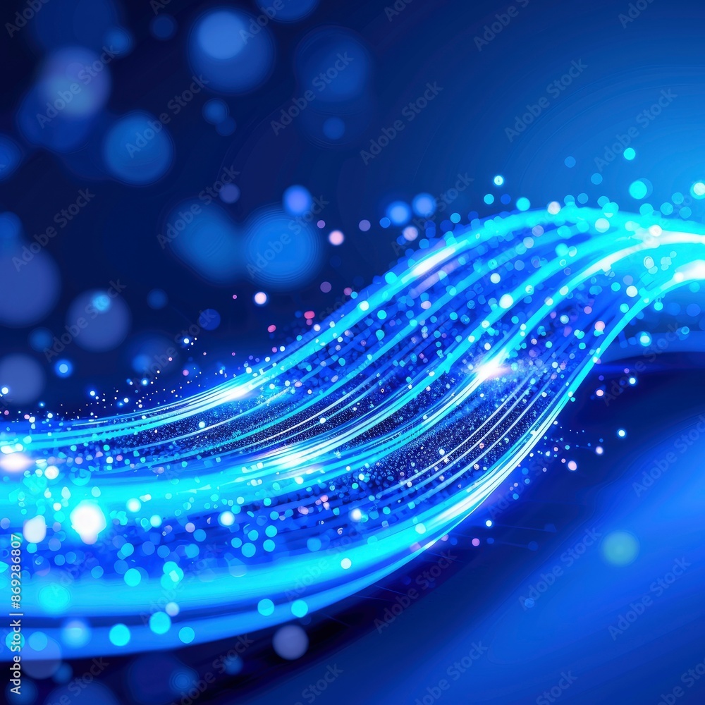 A closeup of glowing blue neon optical fiber cable on blur background A closeup of glowing blue neon optical fiber cable on blur background