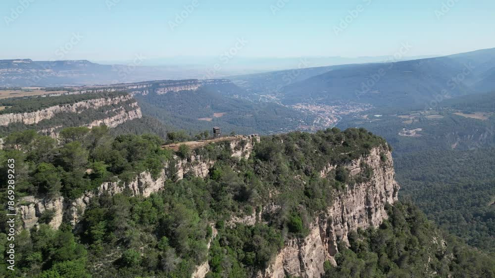 Amazing aerial view of a cliff surrounded by trees Amazing aerial view of a cliff surrounded by trees