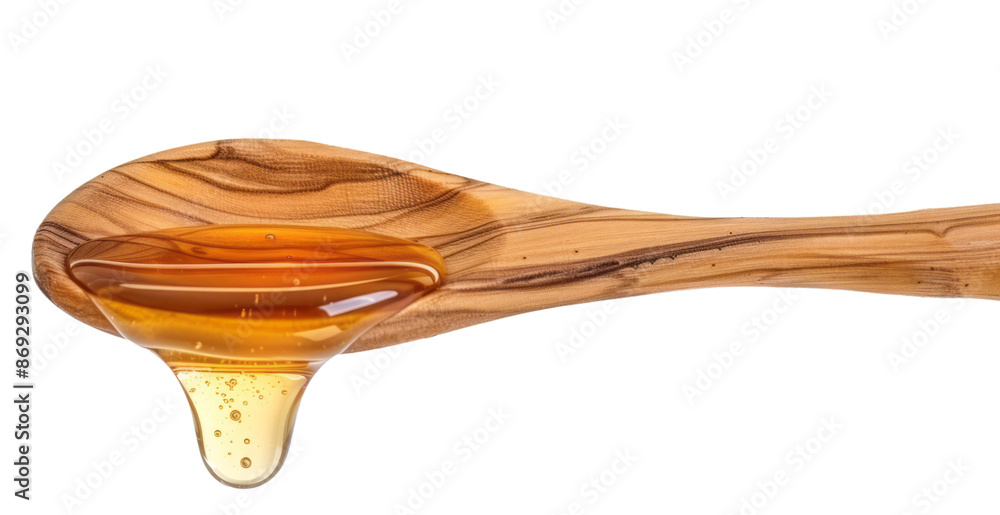 Honey dripping from a wooden spoon, isolated on a transparent background. Honey dripping from a wooden spoon, isolated on a transparent background.