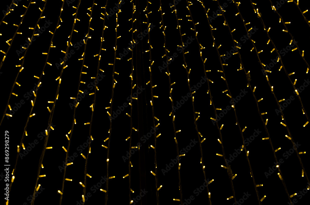Fototapeta premium christmas decor yellow led lights close up
