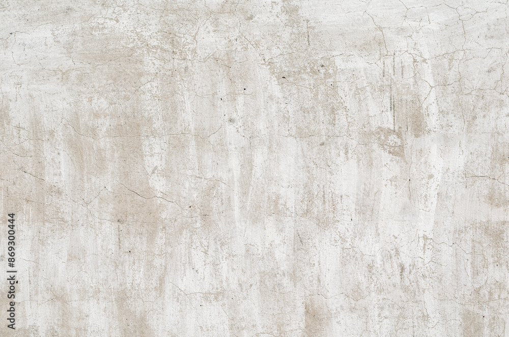 Fototapeta premium old concrete wall with paint residues close up