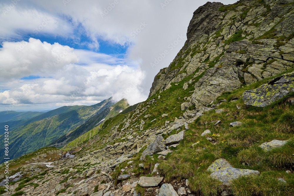 Landscape with the Fagarasi mountains in Romania on a summer day. Landscape with the Fagarasi mountains in Romania on a summer day.