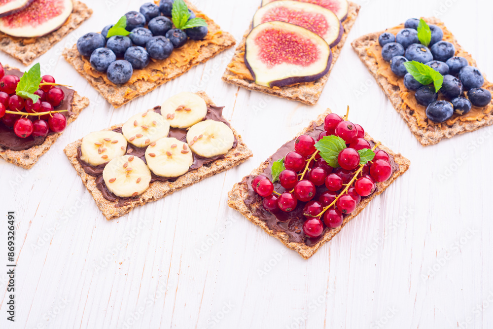 Protein toast crispbread with delicious toppings top view Protein toast crispbread with delicious toppings top view