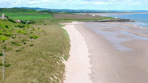Wallpaper Mural Aerial footage of Bamburgh beach and Castle in summer Torontodigital.ca
