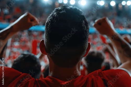 A team celebrating a goal in a stadium filled with virtual fans and digital banners with copy space photo