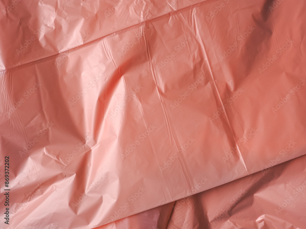 Fototapeta premium Old rose colored plastic bag texture for abstract background. 