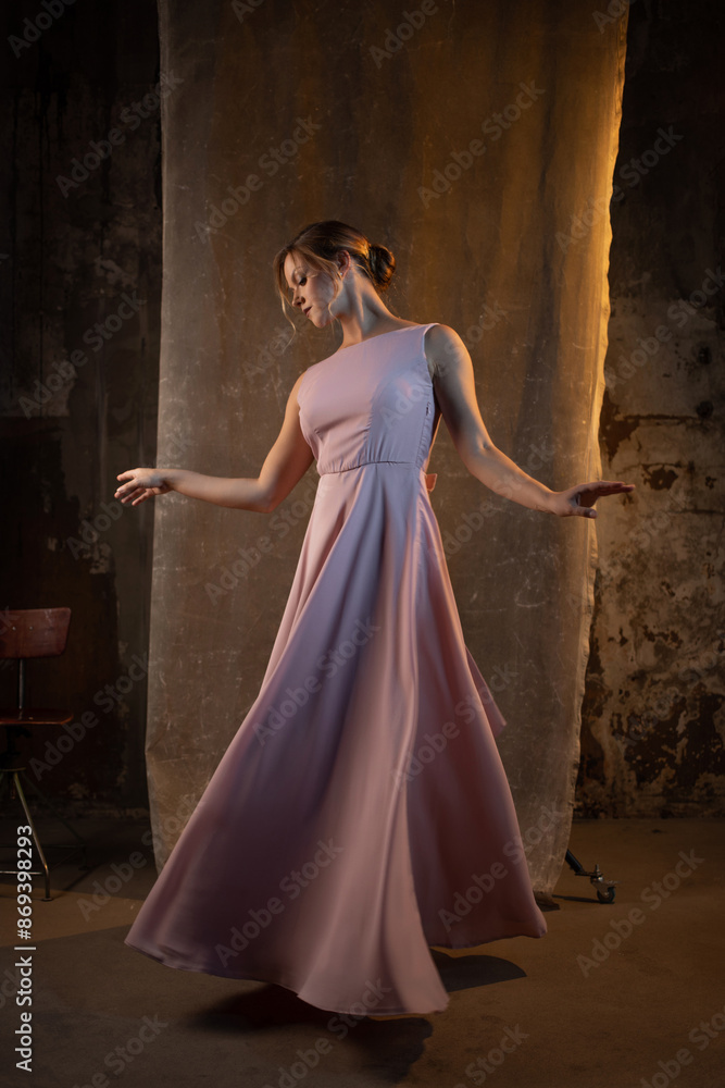 A beautiful blonde in a beautiful delicate pink dress A beautiful blonde in a beautiful delicate pink dress
