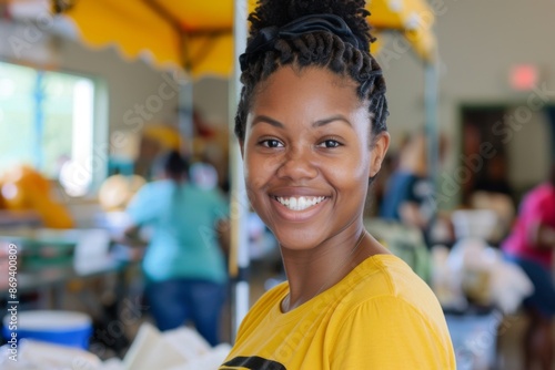 Young African American female volunteer at community center