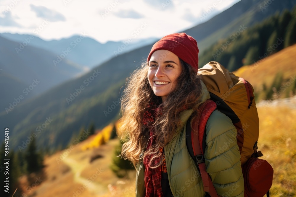 Photo of happy smiling woman hiking in mountains. Photo of happy smiling woman hiking in mountains.