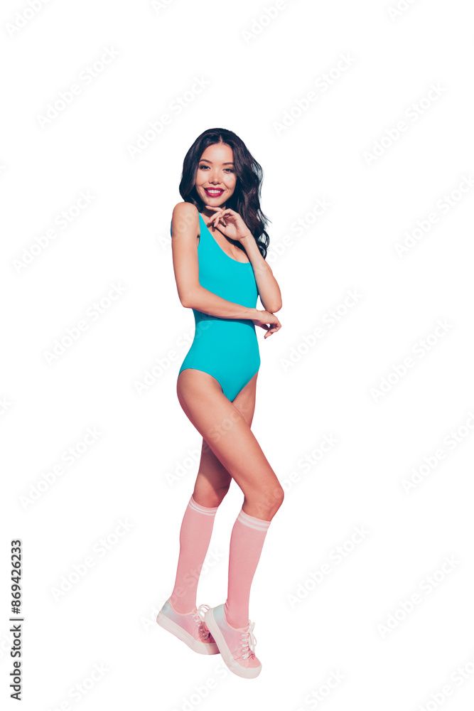Vertical full length body size of cheerful modest lovely sweet slim fit thin graceful feminine wavy-haired lady blue outfit one-piece swimsuit sneakers shoes footwear isolated over pink background Vertical full length body size of cheerful modest lovely sweet slim fit thin graceful feminine wavy-haired lady blue outfit one-piece swimsuit sneakers shoes footwear isolated over pink background