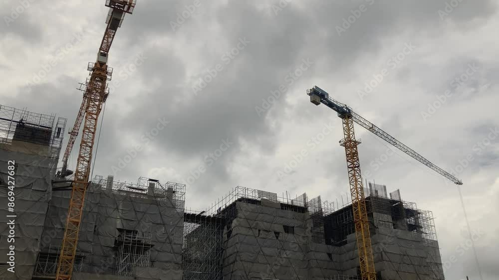 Building site under construction with Tower cranes. Building site under construction with Tower cranes.