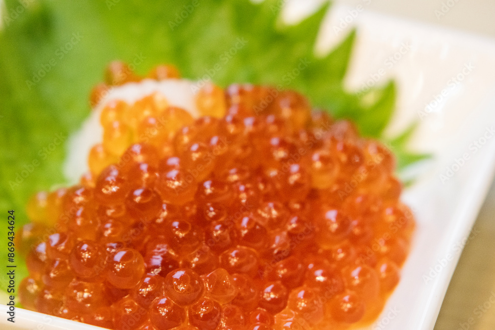Bowl of fresh salmon roe. Bowl of fresh salmon roe.