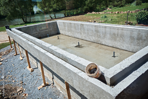 Pool construction, plastered pool. Selective focus