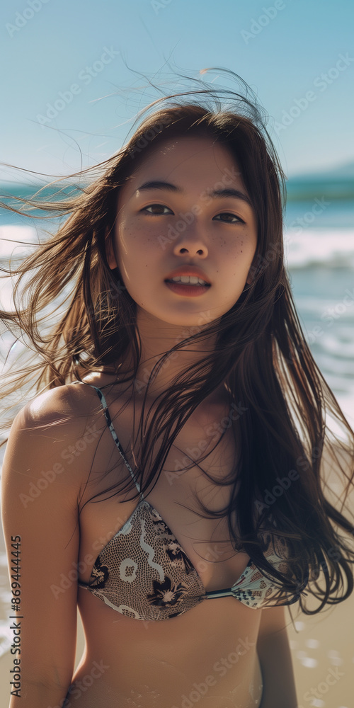 Asian female model wearing bikini on the beach Asian female model wearing bikini on the beach