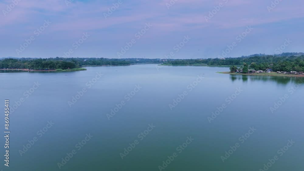 Aerial view of reservoir with green local forest Aerial view of reservoir with green local forest