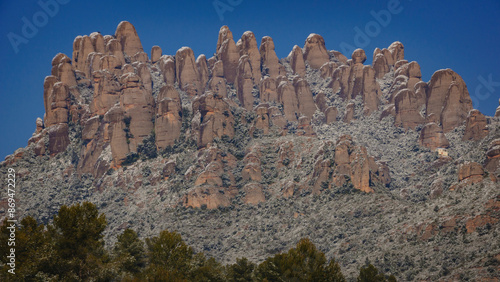 Snowy Montserrat mountains in winter, seen from El Bruc (Anoia, Barcelona, Catalonia, Spain) photo