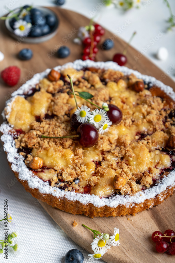 Freshly Baked Cherry Crumble Pie, Berry Pie over Summer Background Freshly Baked Cherry Crumble Pie, Berry Pie over Summer Background