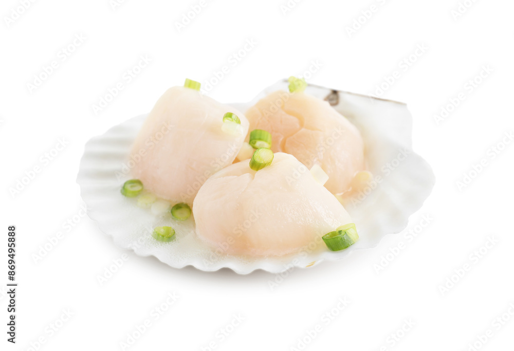 Raw scallops with green onion and shell isolated on white Raw scallops with green onion and shell isolated on white