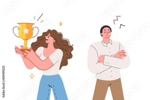 Superiority woman received gold cup for winning competition, over man standing with arm crossed