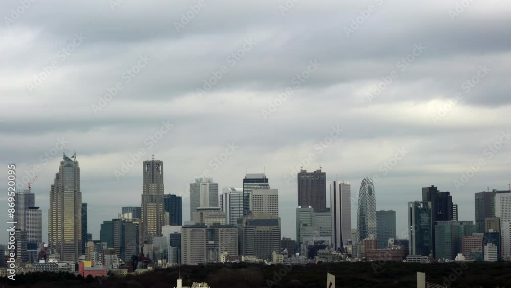 A cityscape with tall buildings and a clear blue sky. The city is bustling with activity and people A cityscape with tall buildings and a clear blue sky. The city is bustling with activity and people