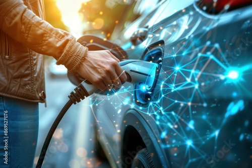 Person charging electric car with futuristic digital concept overlay connecting the vehicle to a network, symbolizing innovation and sustainability.
