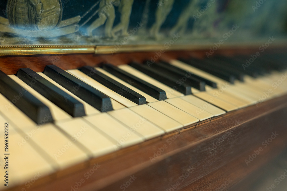 Close-up of a Piano Keyboard with a Painting in the Background Close-up of a Piano Keyboard with a Painting in the Background