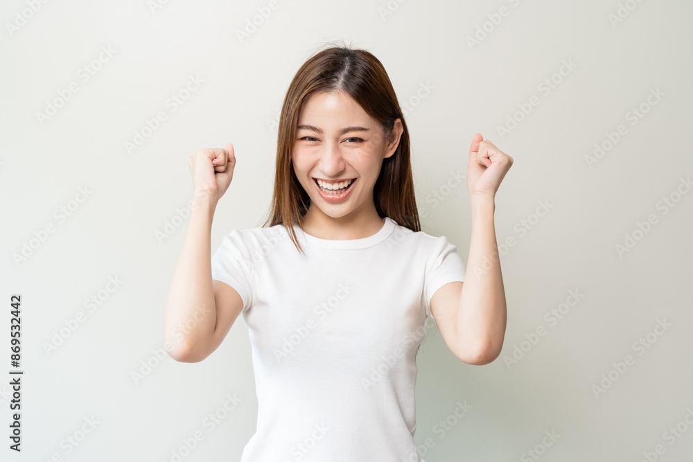 Beautiful young lady in happiness moment, woman smiling and laughing celebrate success isolated on background Beautiful young lady in happiness moment, woman smiling and laughing celebrate success isolated on background