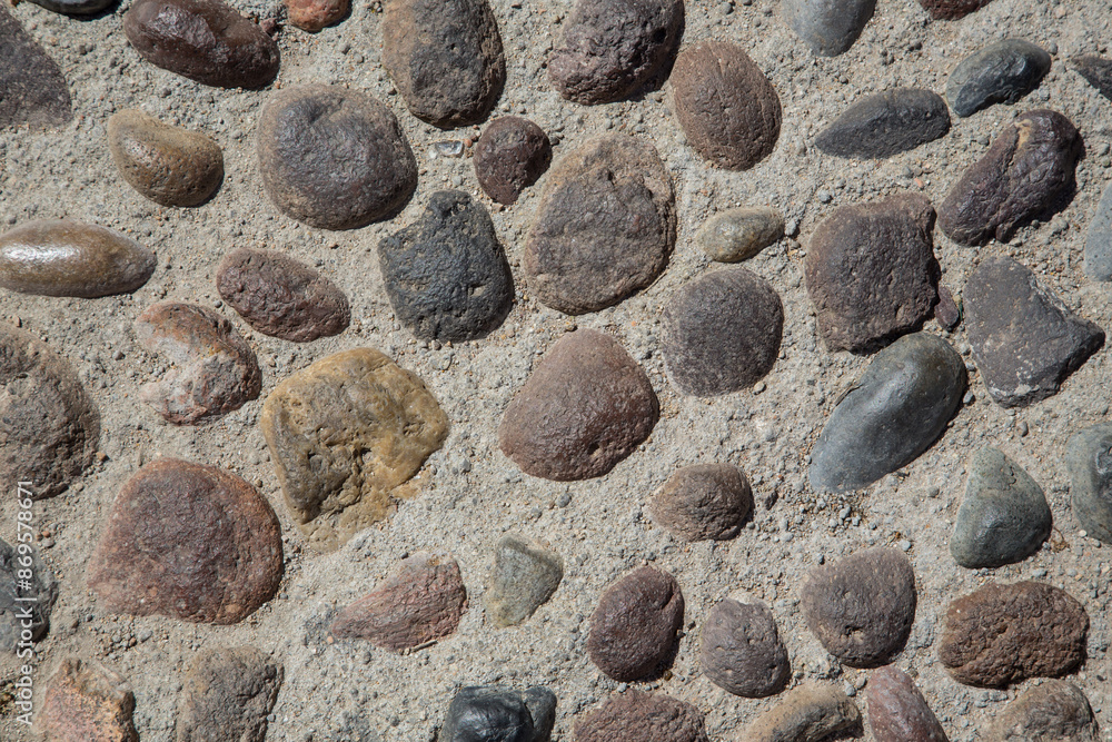 House wall with pebble stones and filled with cement, seen in Sardinia, Italy-Natural stone texture for architecture, garden design, landscaping or environmentally sustainable engineering House wall with pebble stones and filled with cement, seen in Sardinia, Italy-Natural stone texture for architecture, garden design, landscaping or environmentally sustainable engineering