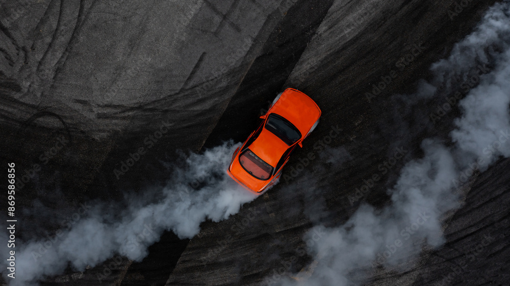 Aerial top view car drifting diffusion race drift car with lots of smoke from burning tires on speed track, Professional driver drifting car with lots of white smoke.