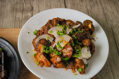 Foto Chicken gizzard and liver cooked in Indian style