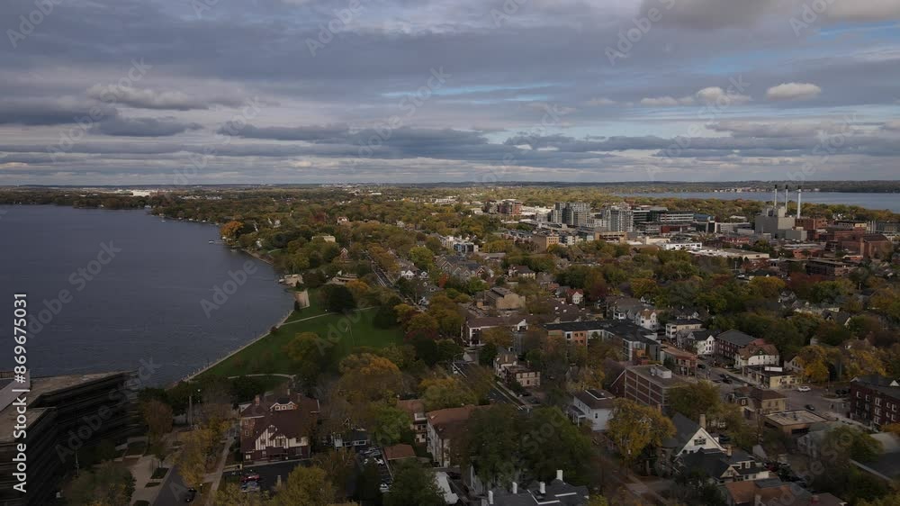 View of a lake in Madison Wisconsin. Drone footage flying over the lake near the waterfront View of a lake in Madison Wisconsin. Drone footage flying over the lake near the waterfront