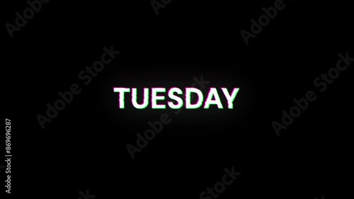 Tuesday text with screen effects of technological failures. Spectacular screen glitch with various kinds of interference. Looped