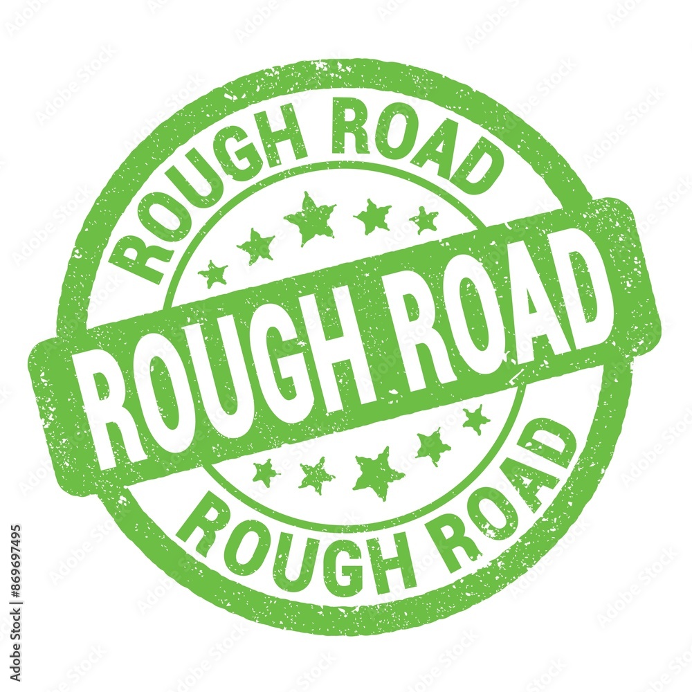 ROUGH ROAD text written on green round stamp sign. ROUGH ROAD text written on green round stamp sign.