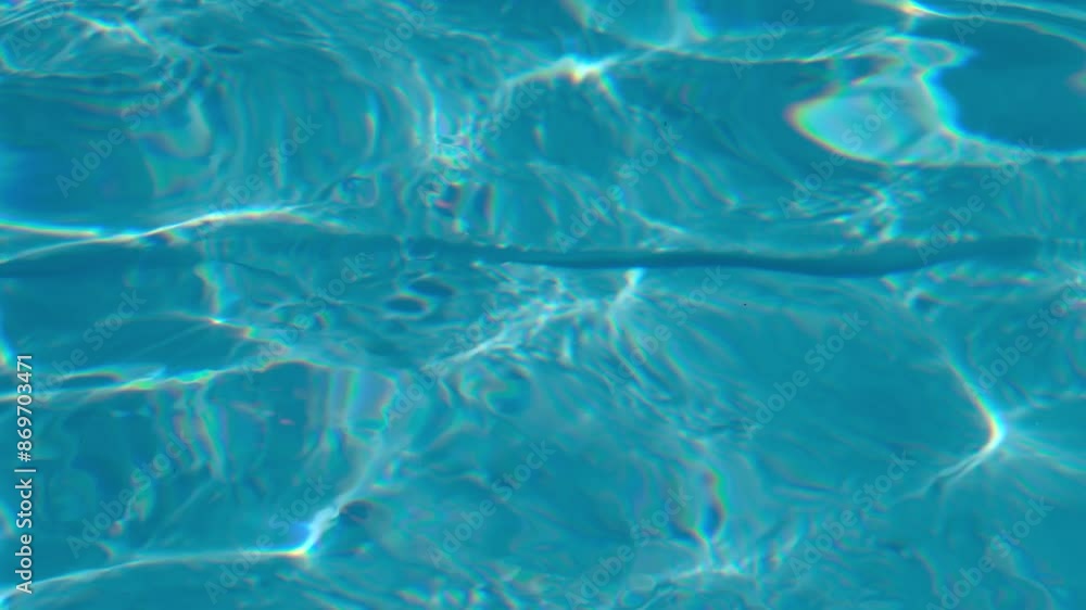 Rippling pool water on a sunny day Rippling pool water on a sunny day