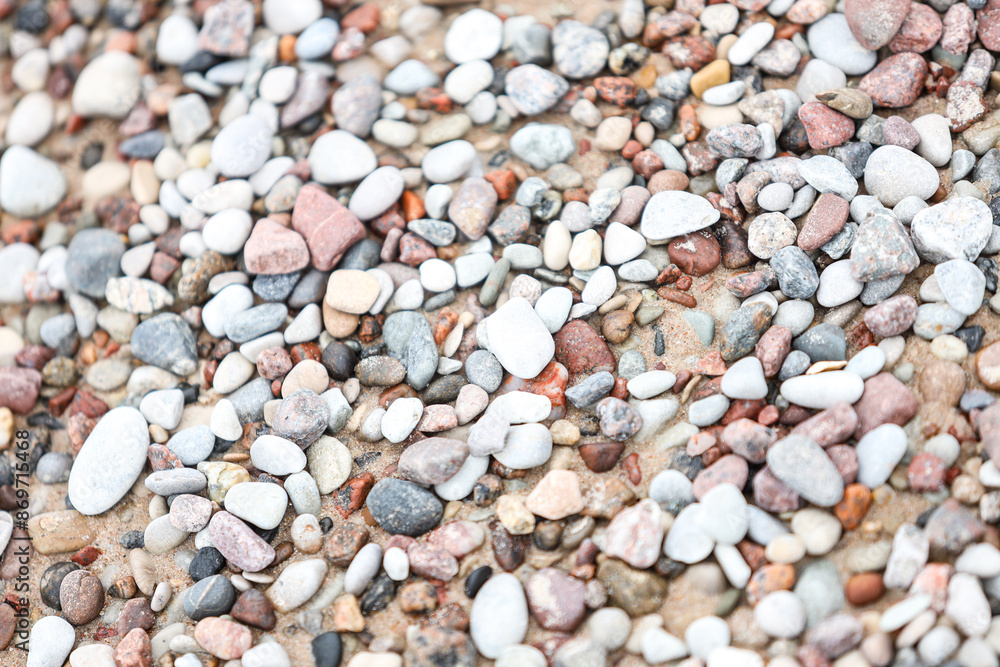 Close-up photo with small seaside rocks near Baltic Sea. Photo taken on a cloudy, gray tone day. Close-up photo with small seaside rocks near Baltic Sea. Photo taken on a cloudy, gray tone day.