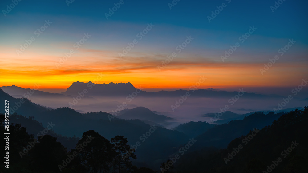 Doi Luang Chiang Dao misty mountain landscape at morning in cloudy sunrise sky Doi Luang Chiang Dao misty mountain landscape at morning in cloudy sunrise sky