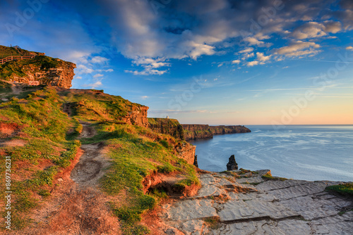 Schilderij op canvas Beautiful sunset over the Cliffs of Moher in County Clare, Ireland