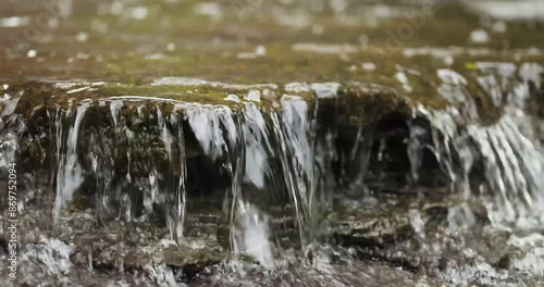 Wallpaper Mural Close up video of storm water flowing within a creek or stream. Torontodigital.ca