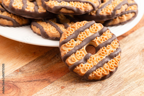 Fudge Striped Shortbreak Cookies on a Wood Kitchen Table photo