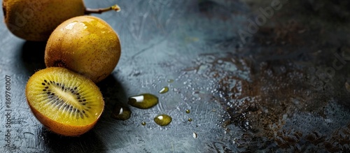 Golden kiwi fruit with copy space image. photo