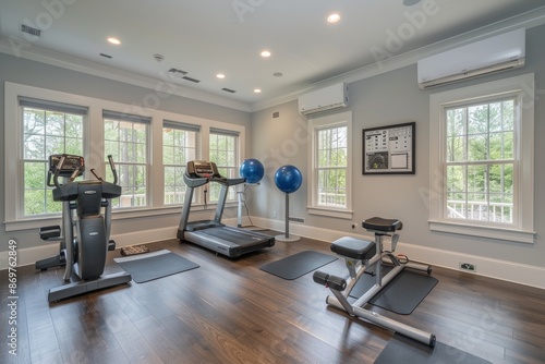 Modern Home Gym with Air Conditioning, State-of-the-Art Equipment, and Scenic Outdoor View