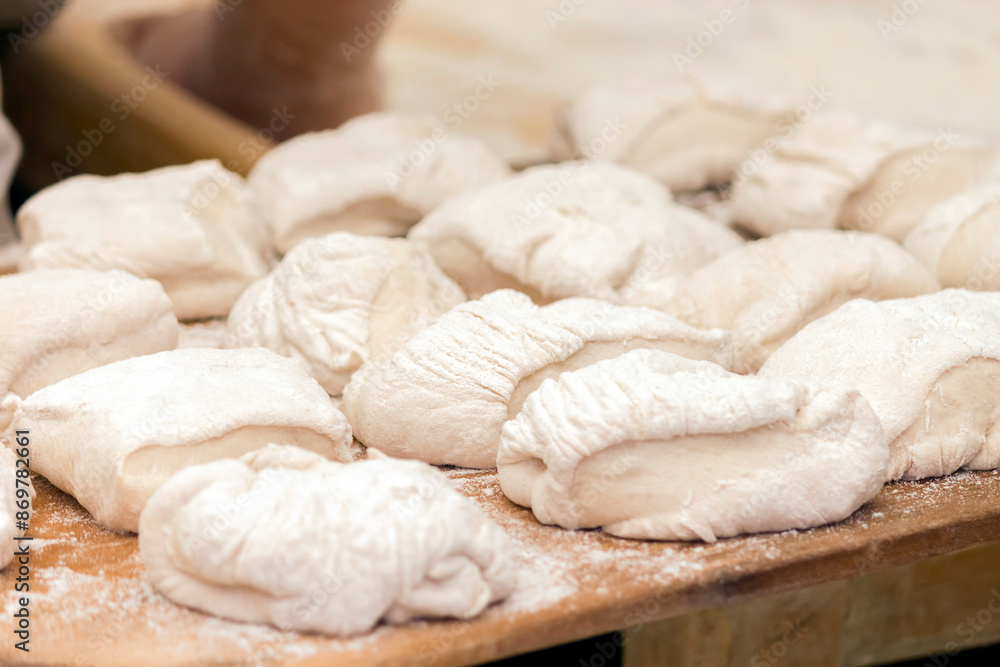 Kneading in the preparation of artisan bread and sweets. Made by expert pastry chefs
Kneading in the preparation of artisan bread and sweets. Made by expert pastry chefs